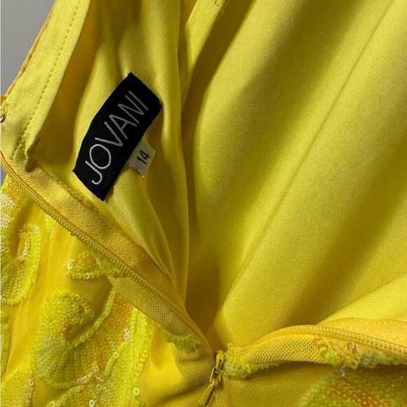 JoVani Yellow Dress
The Jovani 07784A Yellow Pattern Sequin Embellished Gown - Picture 6 of 7